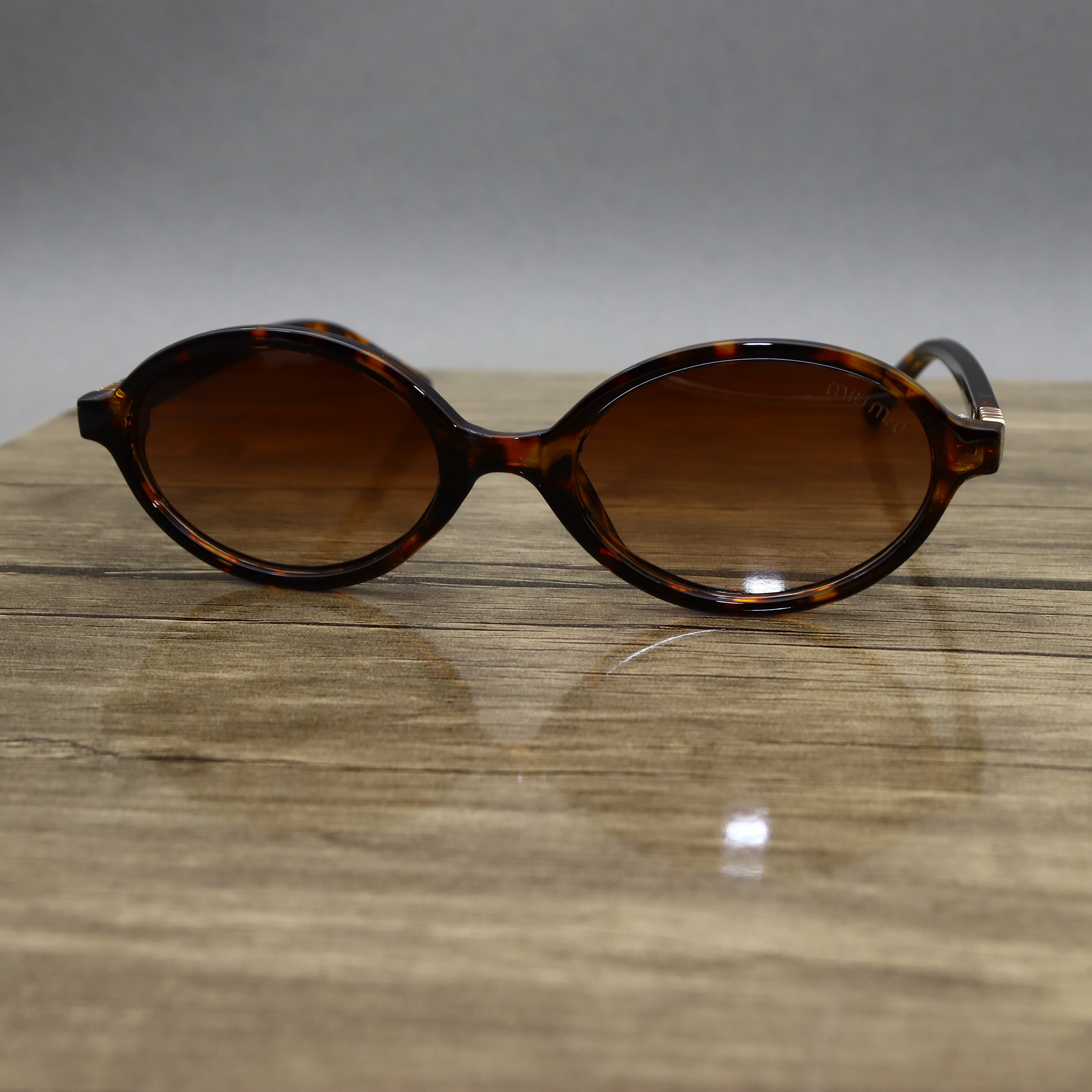 Miu Miu 2512 SMU04Z Tigré