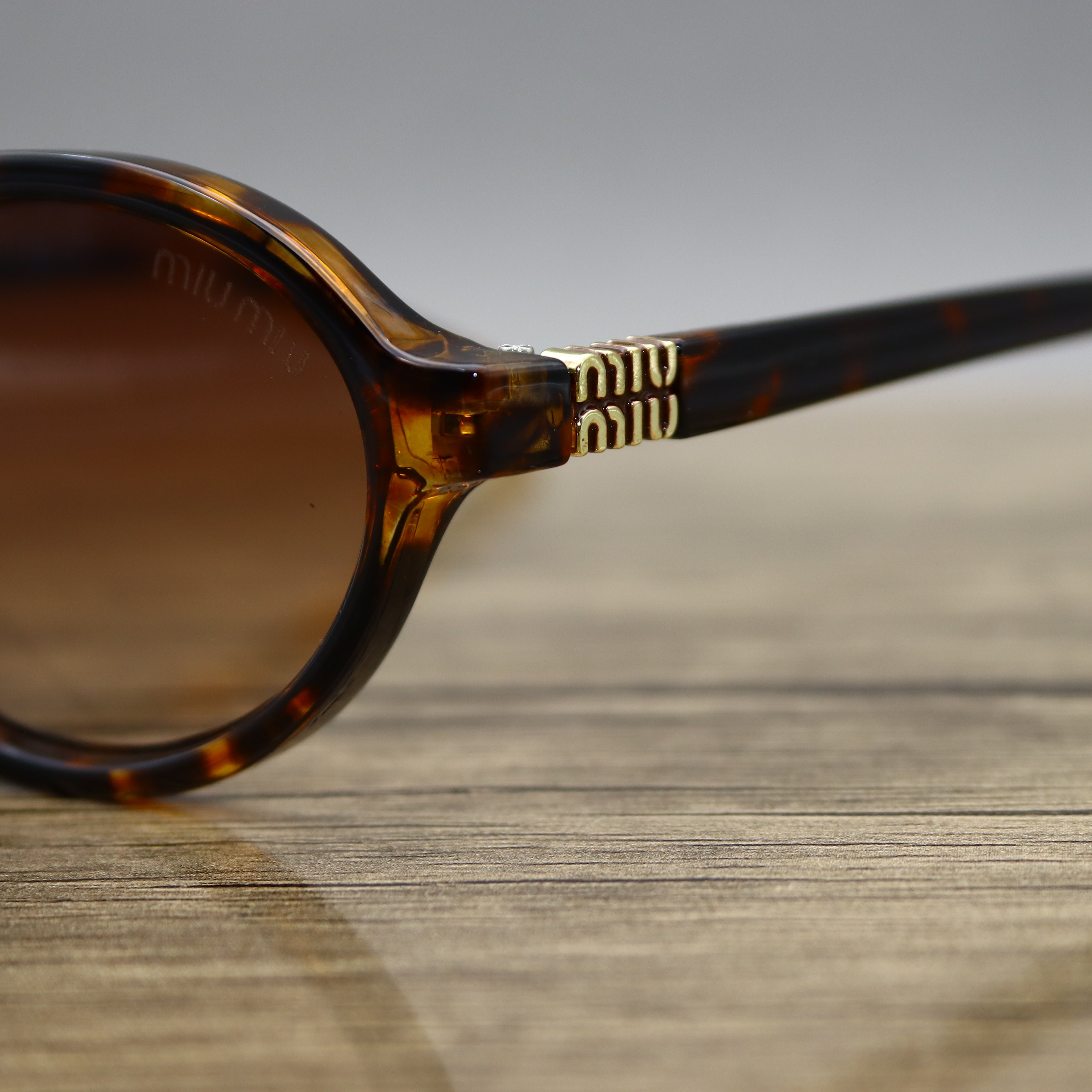 Miu Miu 2512 SMU04Z Tigré