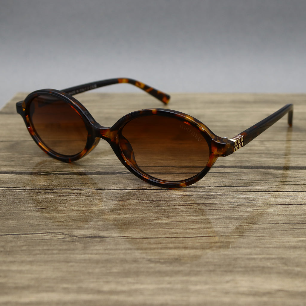 Miu Miu 2512 SMU04Z Tigré