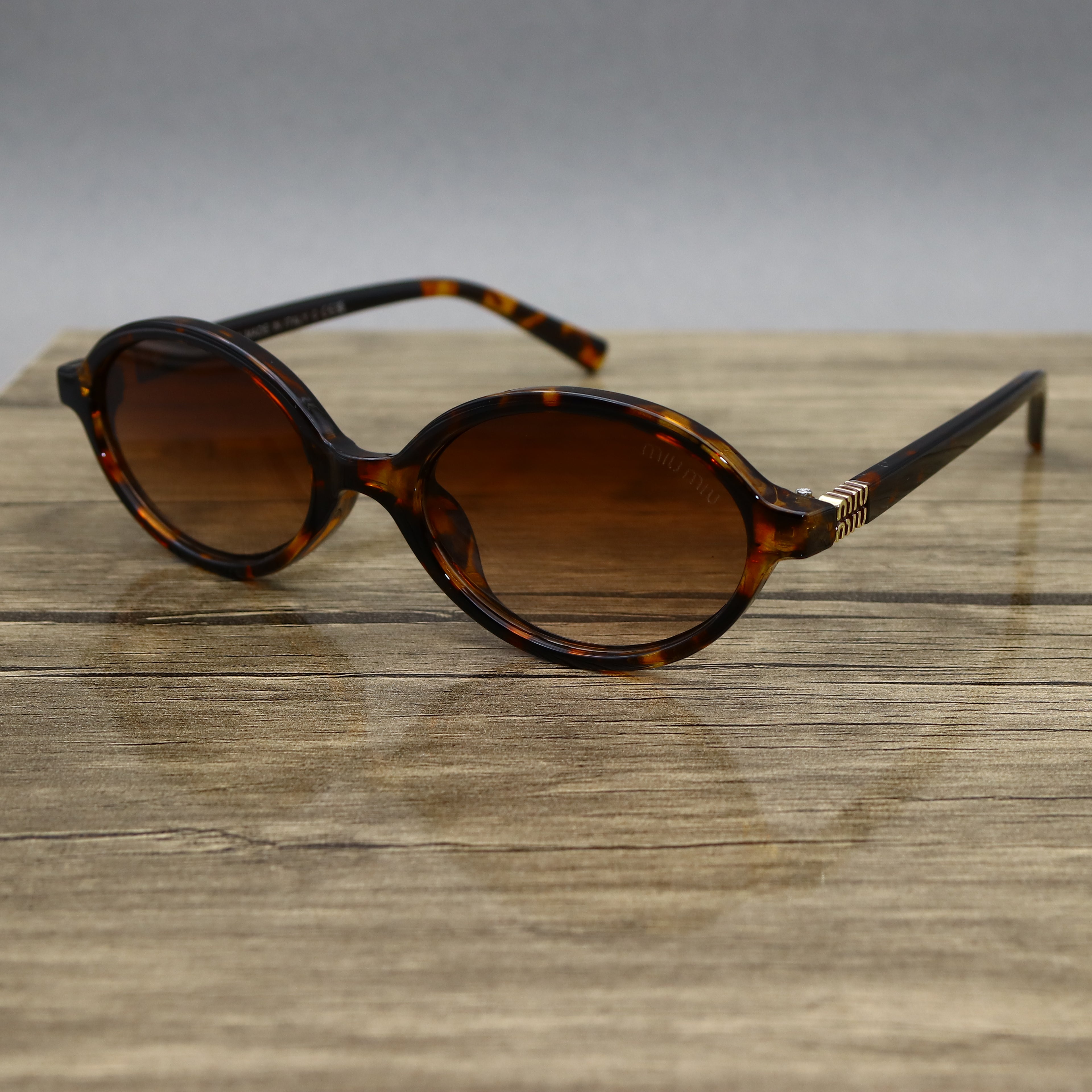 Miu Miu 2512 SMU04Z Tigré